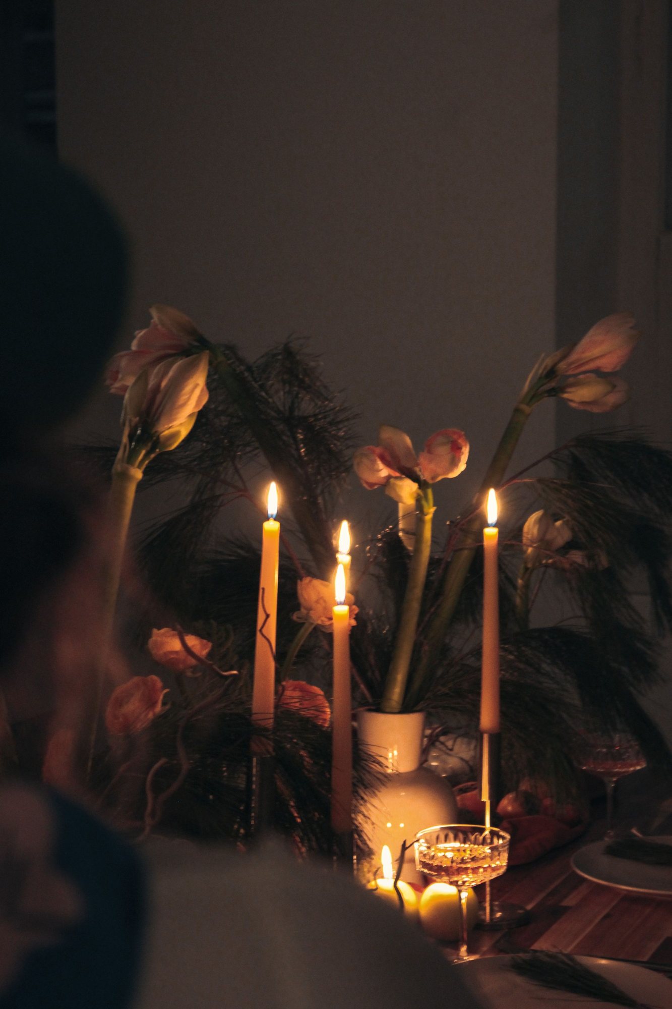 Candles glowing softly in a dark room